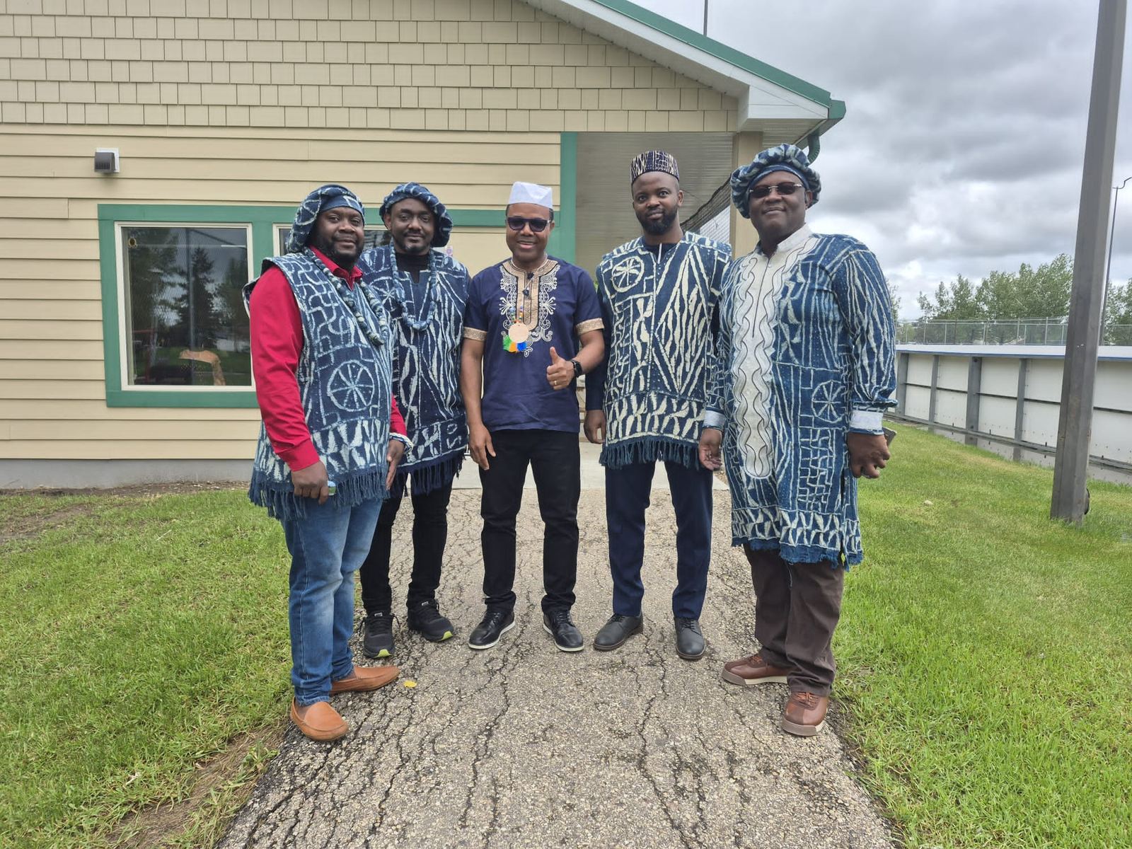 POOLAH members in traditional Toghu attire at the 2026 Cultural Day in Edmonton.